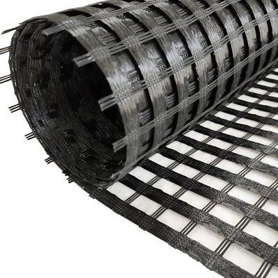 द्विध्रुवीय warp फाइबरग्लास जियोग्रिड रोल लंबाई 50m-100m जाल आकार 25mm X 25mm मिट्टी पृथक्करण और सुदृढीकरण के लिए